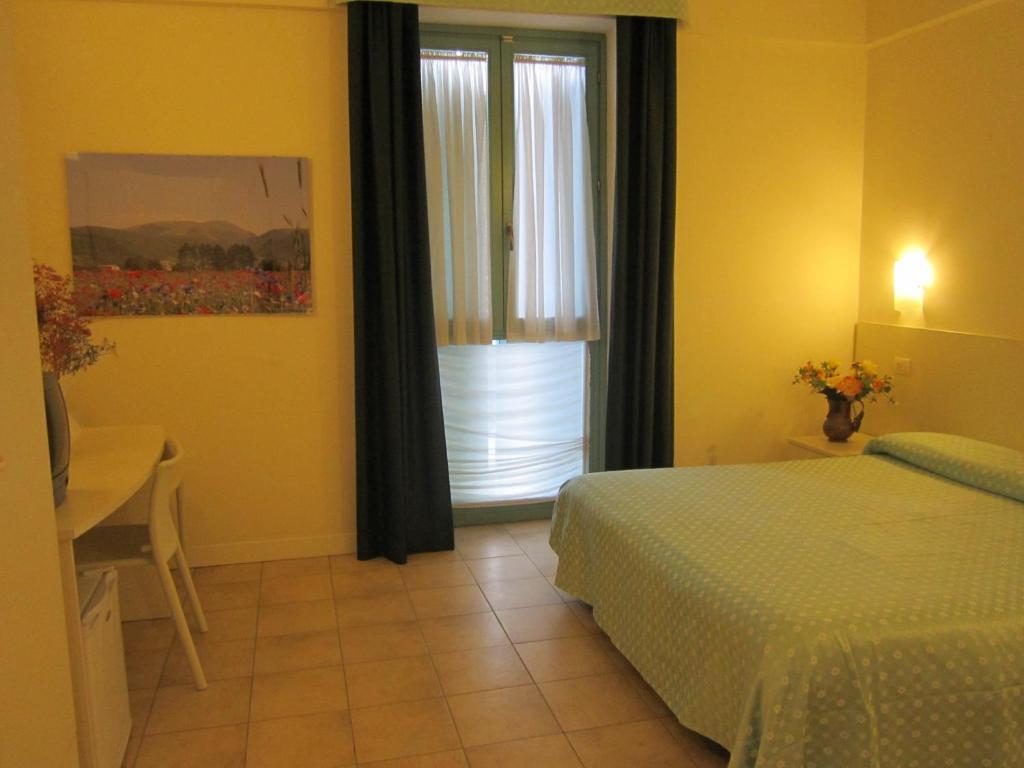 Hotel Lieta Sosta Colfiorito Habitación foto